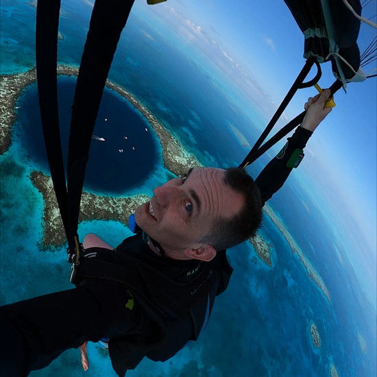 Home 4 Man taking selfie while skydiving